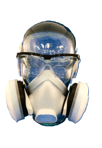 Half-face respirator with twin filter cartridges, worn with safety spectacles